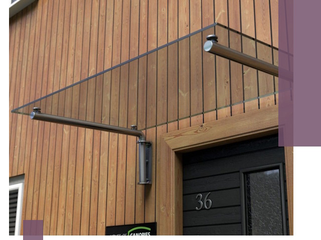 Стеклянные козырьки на входы и фасады в Кронштадте